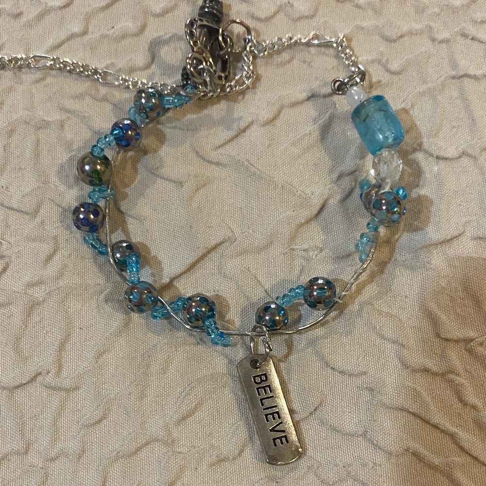 Elegant Blue and Silver 'Believe' Charm Bracelet